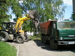 фото Вывоз строительного  и бытового мусора самосвалами КАМАЗ. Погрузка