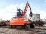 фото Гусеничный перегружатель Develon DX300MH Doosan