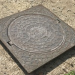 фото Люка для колодцев чугунные.